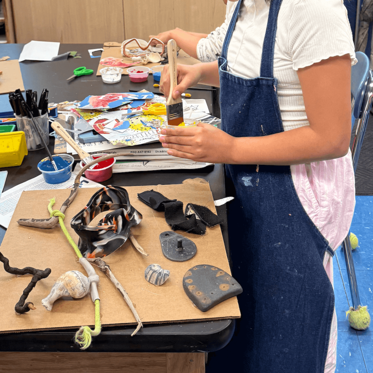 Student in art class