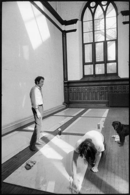 Robert Rauschenberg and his then-studio assistant Brice Marden working on Solstice (1968), with Rauschenberg’s dog Laika, in the chapel of 381 Lafayette Street, New York, 1968. Photo: Henri Cartier-Bresson