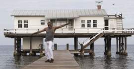 man in front of building